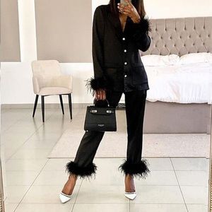 New Black satin w feathery trim on trend sleeper set